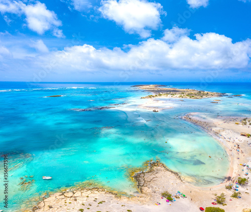 Fototapeta Naklejka Na Ścianę i Meble -  Tropical sandy beach with sandcastles and turquoise water, in Elafonisi, Crete, Greece