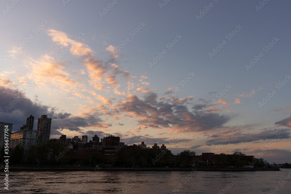 Roosevelt Island Skyline Silhouette during Sunset in New York City along the East River