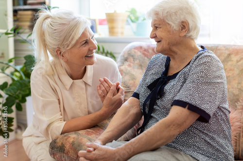 Woman spending time with her elderly mother

 photo