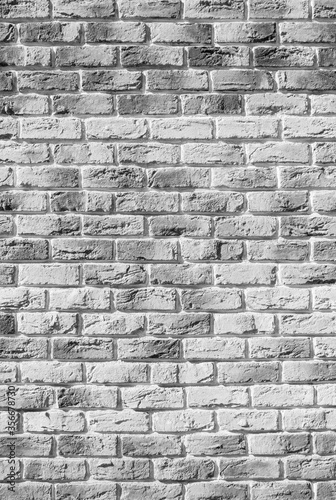 Hand made black and white brick wall, loft. Simple high detail brick wall. Qualitative background or texture.
