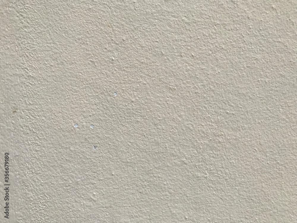 Black mold and yellow stain on old yellow cracked cement wall. Wall cracks that cause mold on the paint. Black mold and yellow stain on old yellow cracked cement wall. Wall cracks that cause mold on the paint.