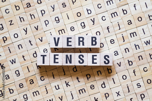 Verb tenses word concept on cubes