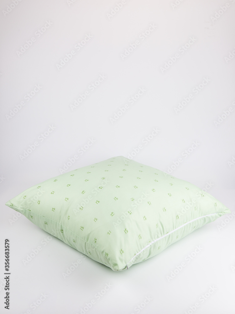 pillow in a cotton cover with a zipper on a white background pillow in a cotton cover with a zipper on a white background