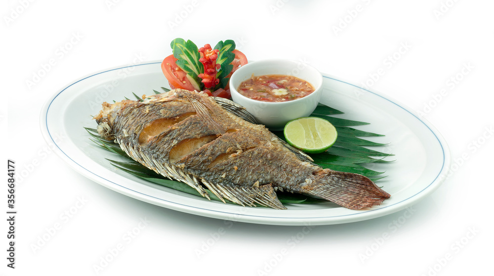 Fried Fish (Tilapia) Served with Chili Spicy Sauce Fried Fish (Tilapia) Served with Chili Spicy Sauce