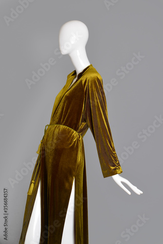 фотографія lifeless mannequin with blue beach dress isolated grey background studio