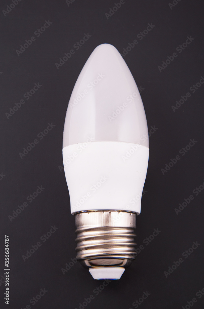 Electric bulb of LED. White on a black background. Electric bulb of LED. White on a black background.