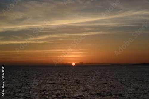 sunset over the ocean © Maryna