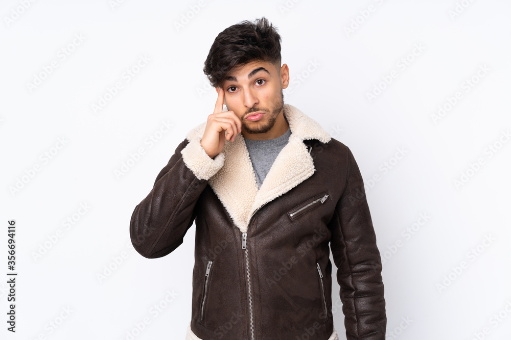 Arabian handsome man over isolated background thinking an idea Arabian handsome man over isolated background thinking an idea