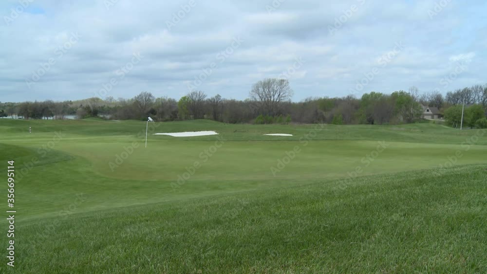 golf course and golfers in the morning in time lapse golf course and golfers in the morning in time lapse