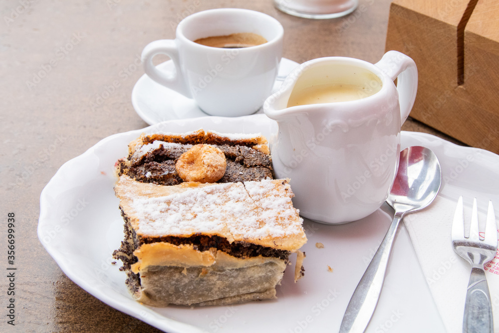 Cake and coffee with cream at cafe Cake and coffee with cream at cafe