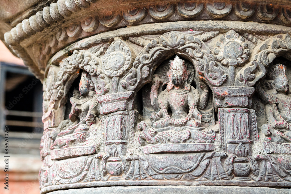 Close up detail of stone carving in Til Mahdev Narayan temple's courtyard, Bhaktapur, Nepal
