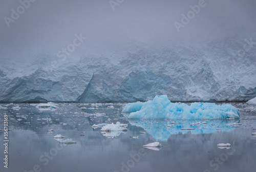 Icebergs along the Grandidier Channel, Antarctica photo