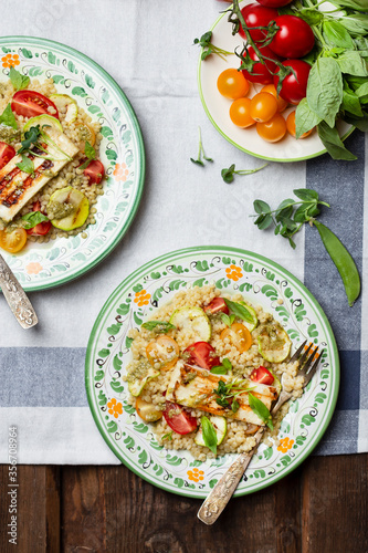 Ptitim or Israeli pasta with tomatoes and halloumi
