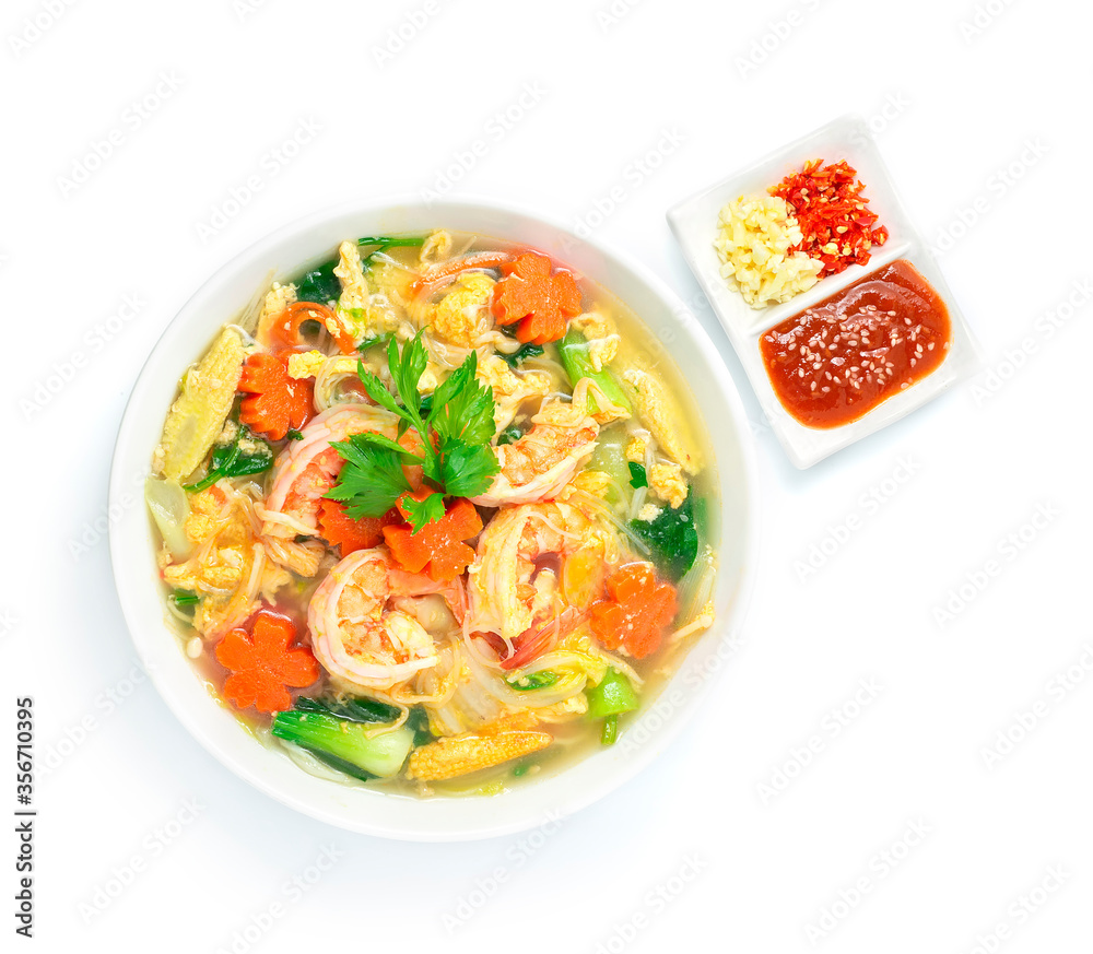 Thai Sukiyaki Soup with Shrimps ,Egg and Vegetables Carved Carrots flowers shape served Sauce