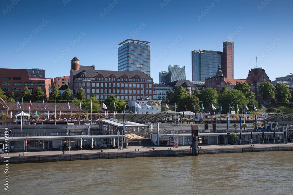 View across the Elbe River to the St Pauli Landing Stages, Port of Hamburg, Hamburg, Germany