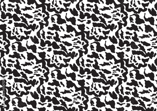 Abstract styled snake scales animal skin seamless pattern design. Black and white seamless camouflage background © Olga_Rom