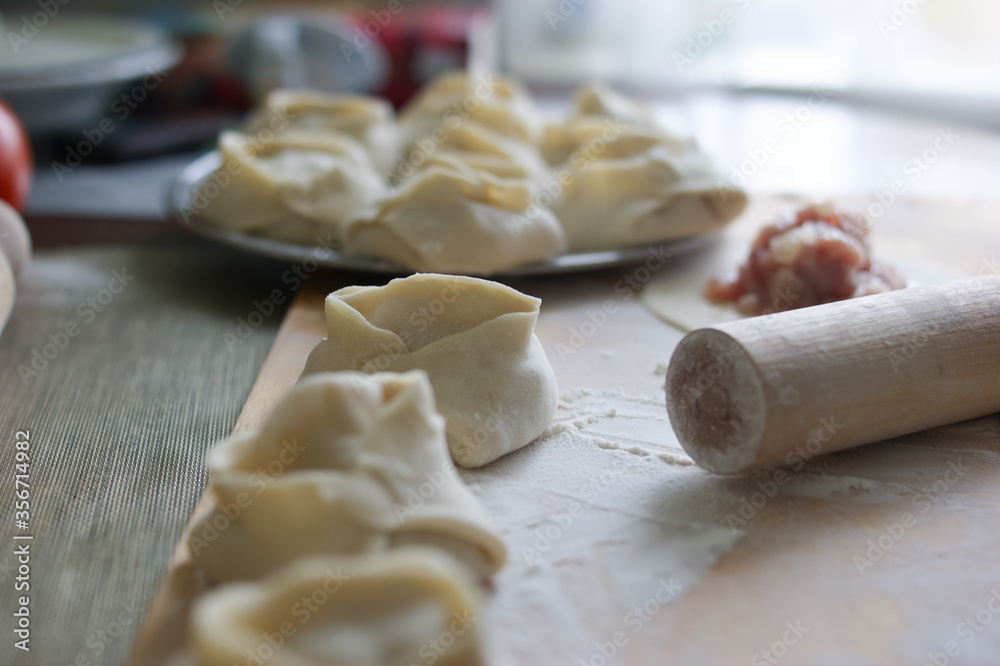 Handmade dumplings process in the kitchen Handmade dumplings process in the kitchen