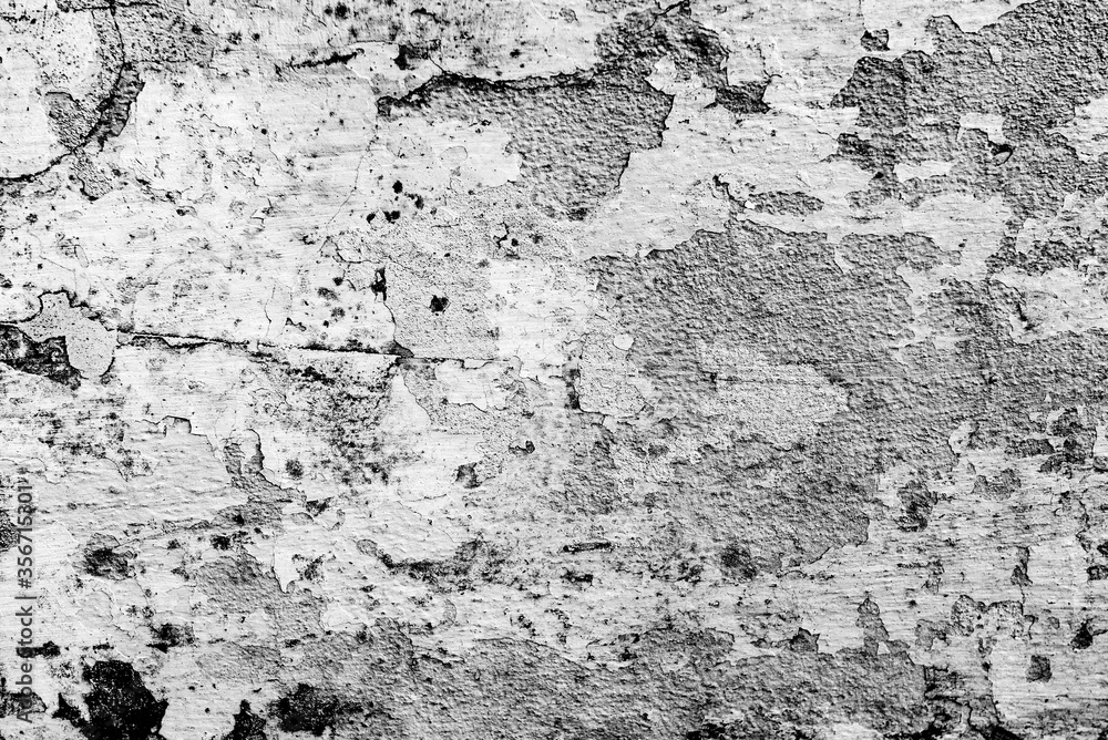 Obraz premium Texture of a concrete wall with cracks and scratches which can be used as a background