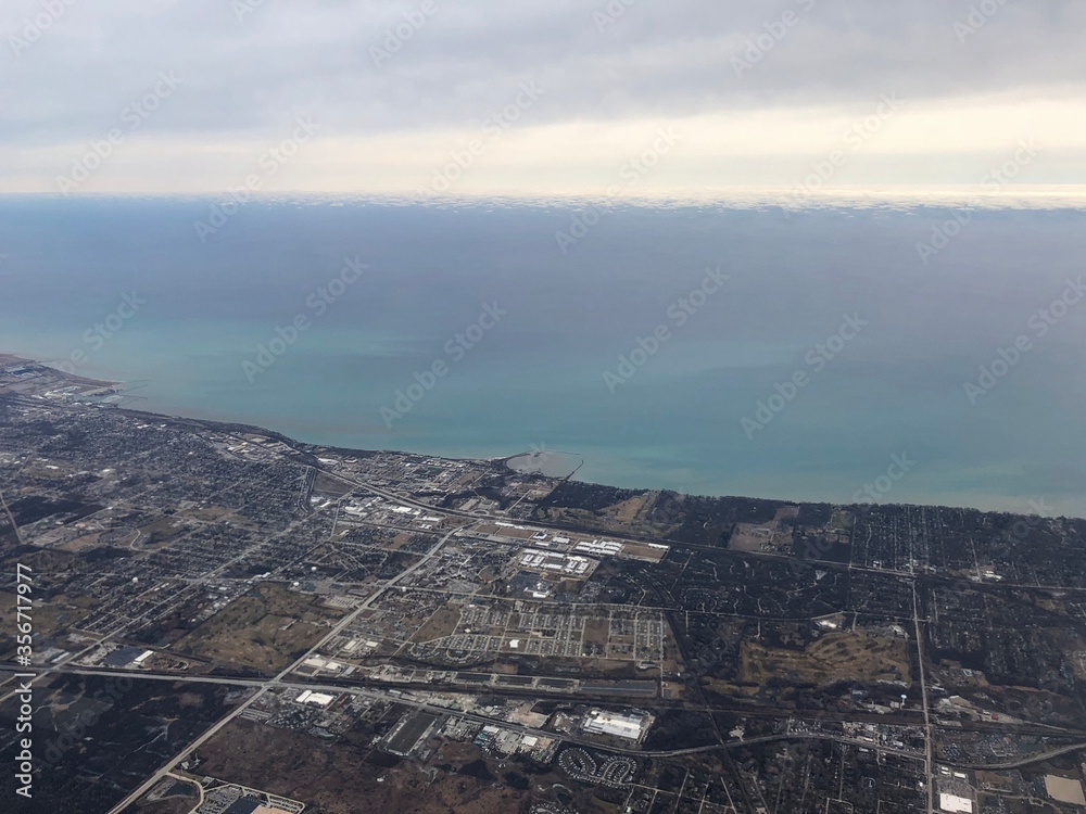 Aerial shot of Chicago near the ocean on a bleak day