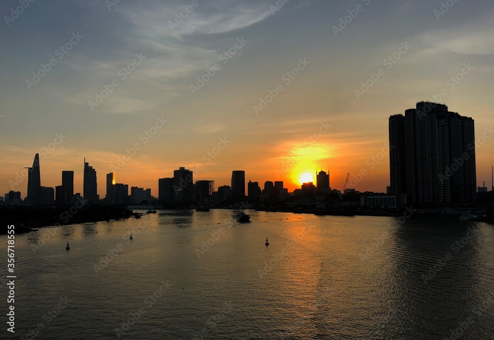 Sunset over skyscrapers in Saigon (Ho Chi Minh city) in Vietnam.