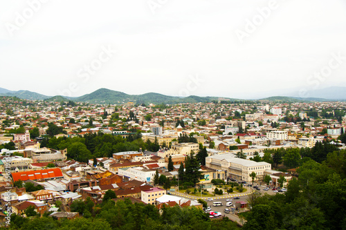 City view of old buildings and architecture, old famous city in Georgia and mountain range. © taidundua