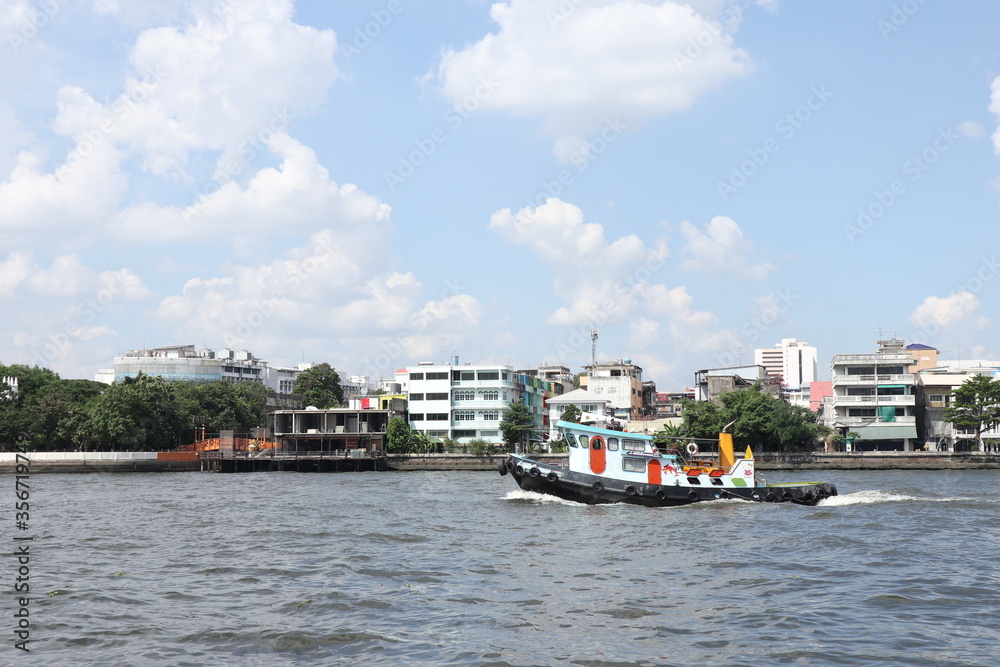 river thames in Bangkok. boat for transporting workers on the Chao Phraya River. river thames in Bangkok. boat for transporting workers on the Chao Phraya River.