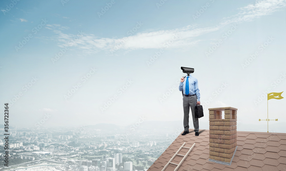 Concept of home security and privacy protection with camera headed man Concept of home security and privacy protection with camera headed man