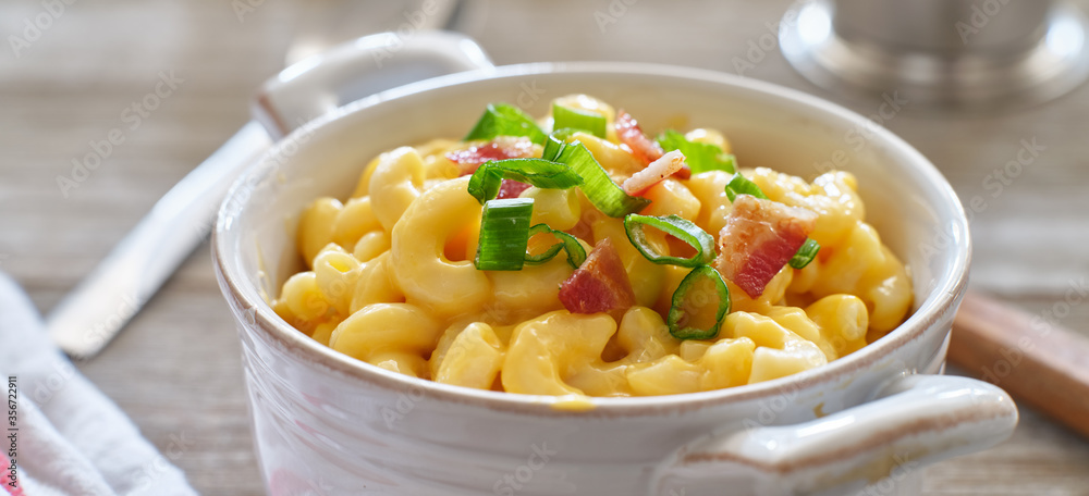 mac and cheese in dish with scallions and bacon garnish mac and cheese in dish with scallions and bacon garnish