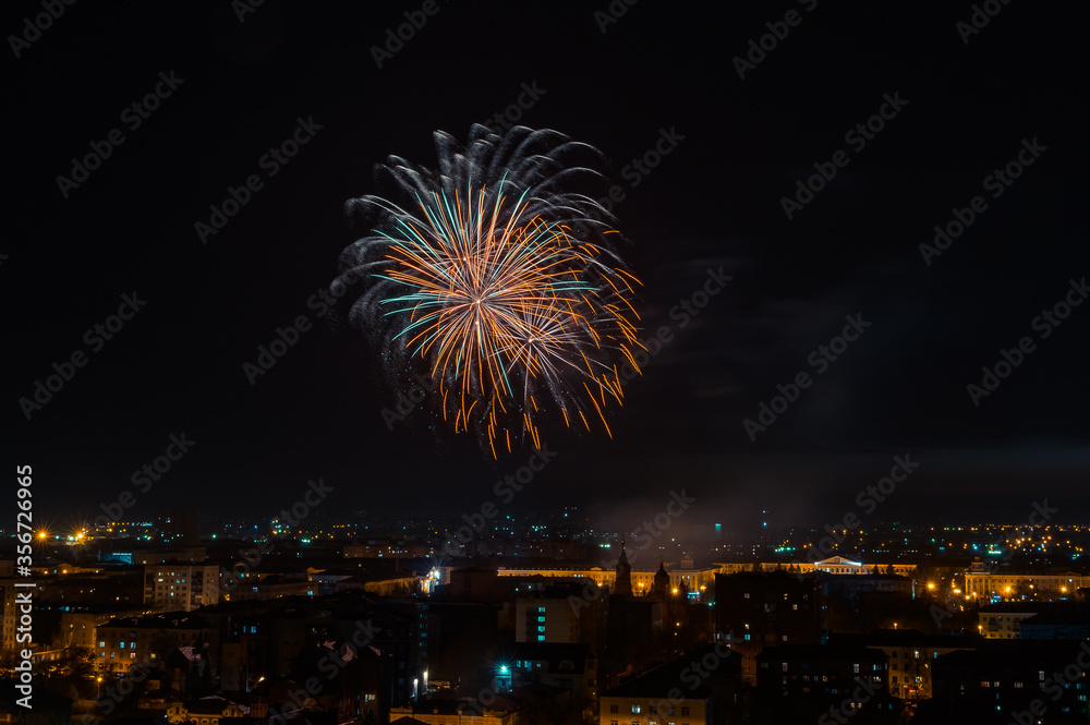 Fototapeta premium fireworks over the night city