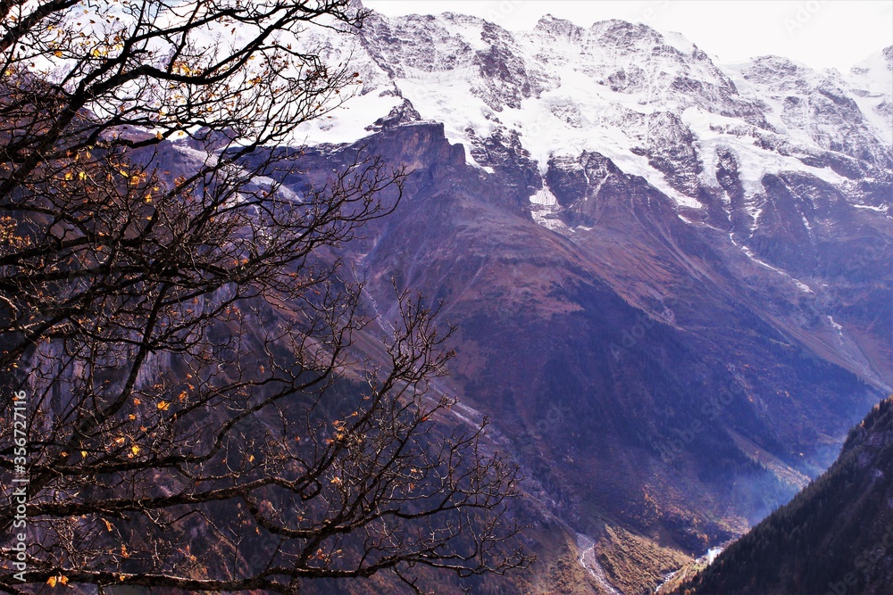 Snow on top of mountains in autumn time,Switzerland