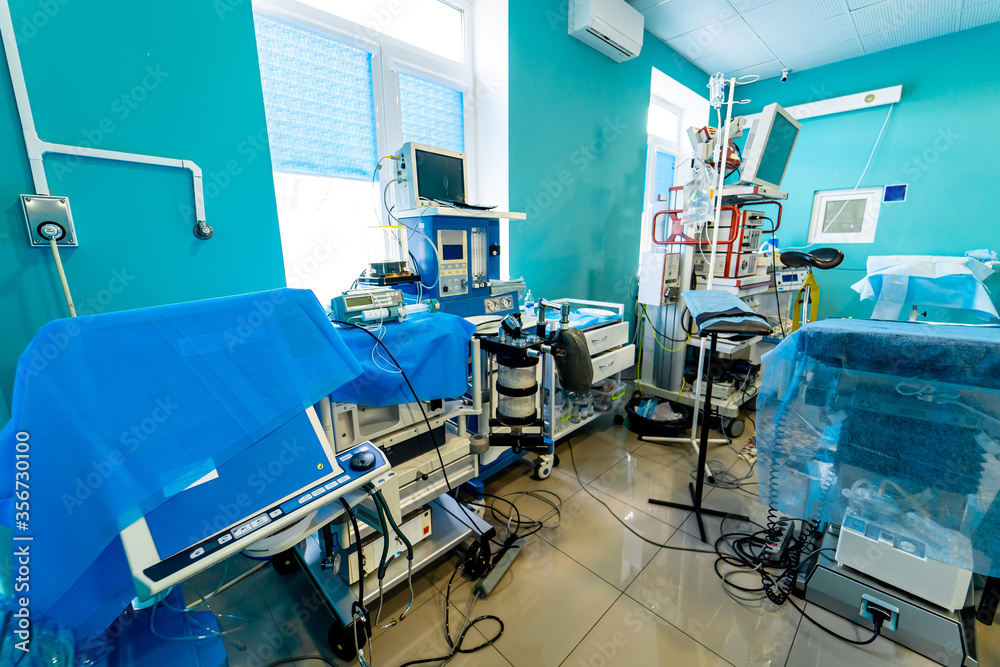 Medical devices, interior hospital design concept. Interior of operating room in modern clinic, screen with tests. closeup Medical devices, interior hospital design concept. Interior of operating room in modern clinic, screen with tests. closeup