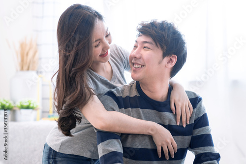 Happy asian couples, They show love by hugging each other.