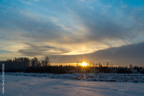 sunset in the winter forest © littleboy72