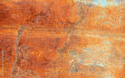 Textured red rust wall background, aged vintage surface, horizontal.