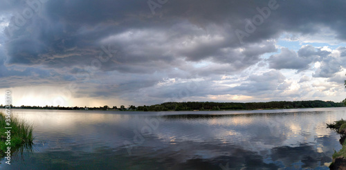 panoramic view of the river in the evening before a thunderstorm