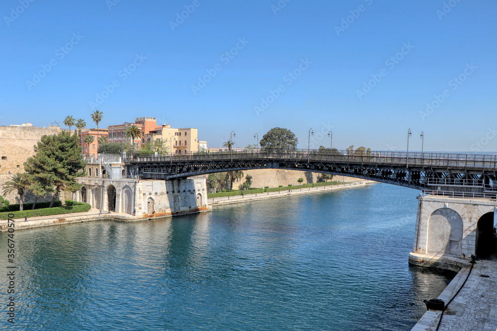 Overview of the Bridge of San Francesco di Paola, commonly called Ponte Girevole (Swing Bridge) and the waterway in Taranto, Puglia, Italy