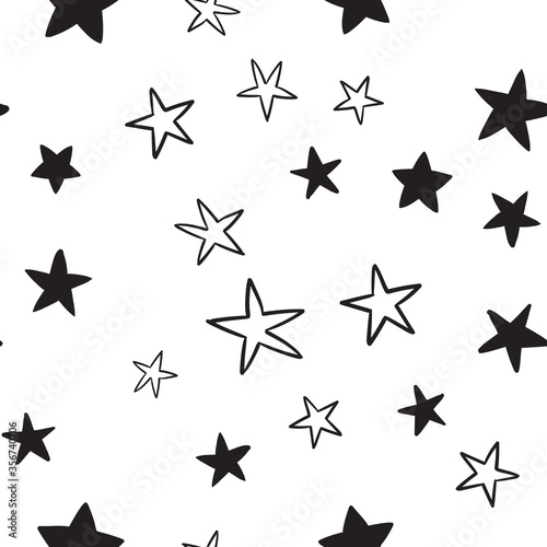 Star doodles seamless pattern. Hand drawn stars background texture.
