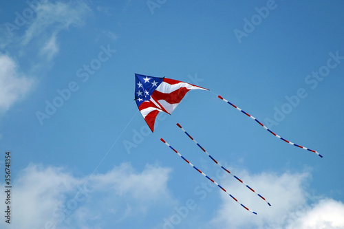 Red White and Blue Kite flying at a Balloon Festival