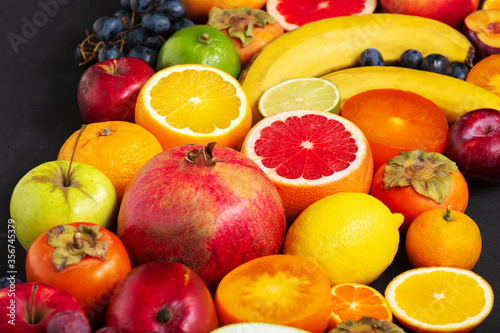 Fruit sources of vitamins  background fruits Fresh . Fresh fruits. Assorted fruits colorful  clean eating  Fruit background. Top view.close up
