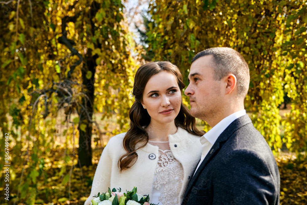 Young male and woman just married. Concept of happy family. Modern family outdoor. Young male and woman just married. Concept of happy family. Modern family outdoor.