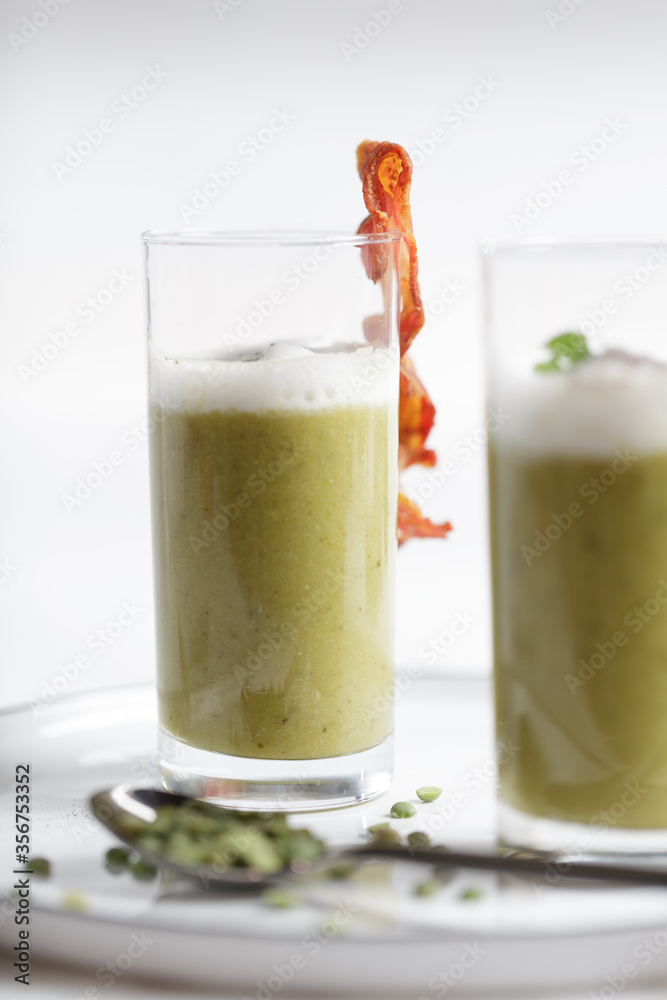Green lentil beans smoothie cream soup with bacon