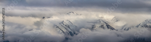 Mountain peaks in the clouds Ile Alatau National Park Tien Shan © Rem.photographer