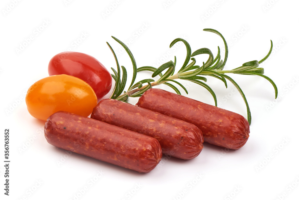 Dry sausages with herbs isolated on white background