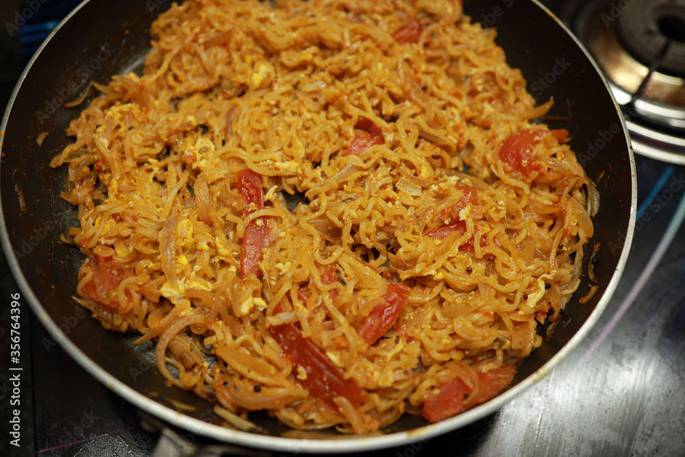 Vegetable Maggie Noodles, Photo of cooking Fry Pan instant noodles . Vegetable Maggie Noodles, Photo of cooking Fry Pan instant noodles .