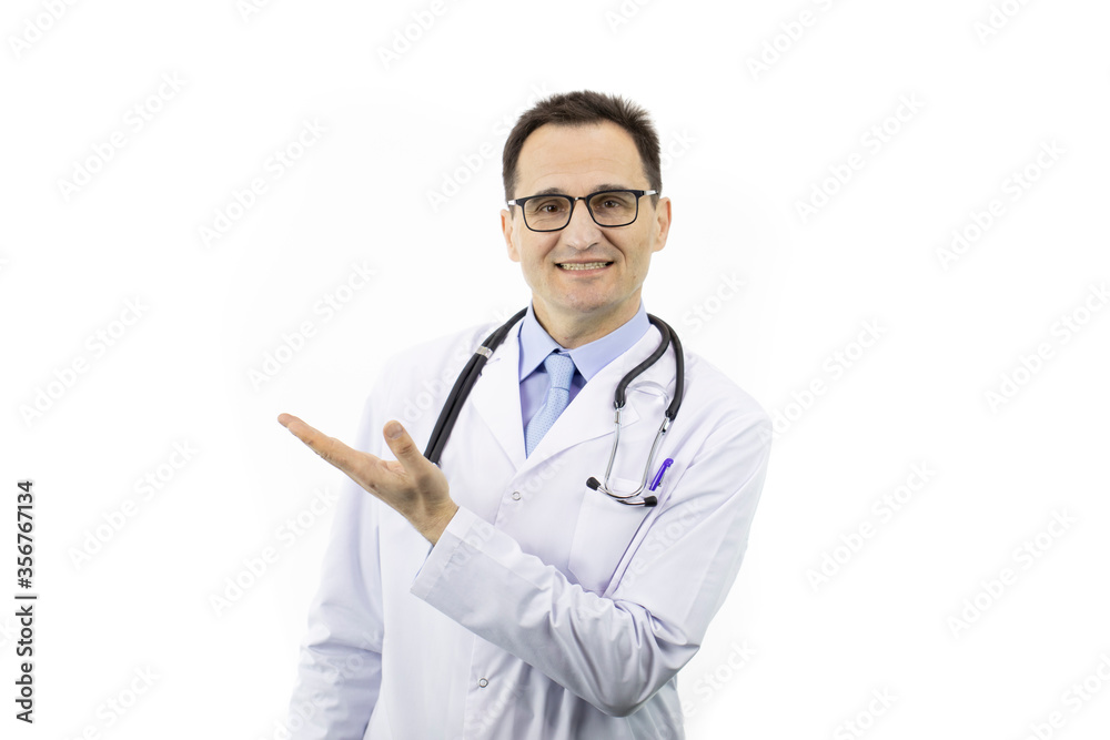 Doctor with fake smile pointing at empty text space isolated on white background. Deceptive offer, health, insurance, fake news, manipulation and medicine ads concept Doctor with fake smile pointing at empty text space isolated on white background. Deceptive offer, health, insurance, fake news, manipulation and medicine ads concept