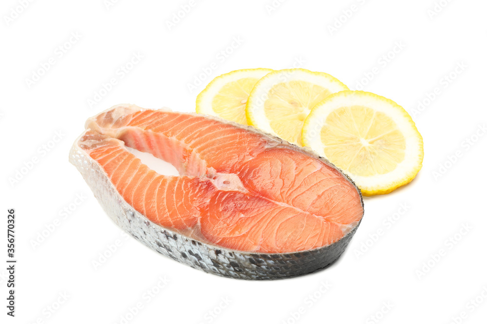 Fresh raw salmon meat and lemon isolated on white background Fresh raw salmon meat and lemon isolated on white background