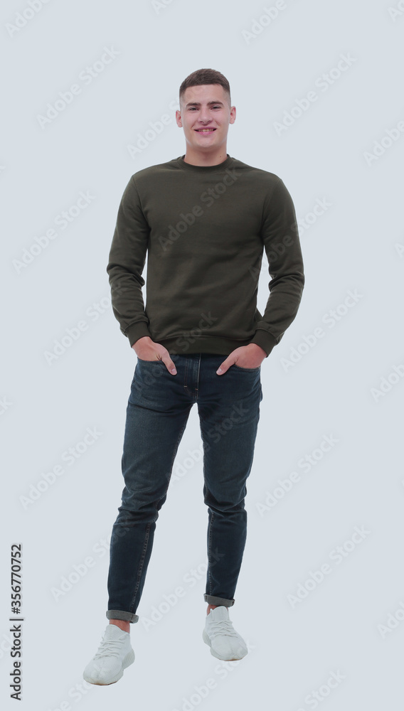 in full growth. smiling ordinary man in jeans in full growth. smiling ordinary man in jeans