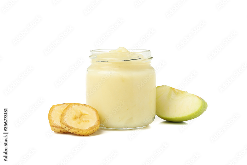 Glass jar with healthy baby food isolated on white background Glass jar with healthy baby food isolated on white background