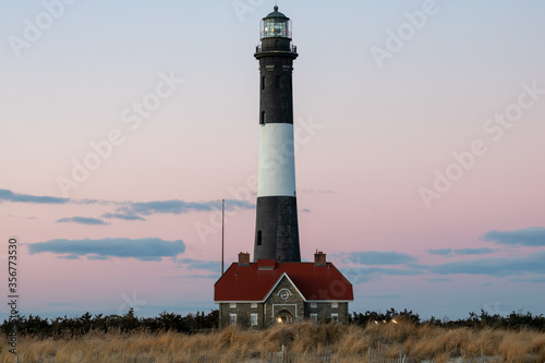 Close up of a lighthouse at dusk. Fire Island, Long Island New York. 