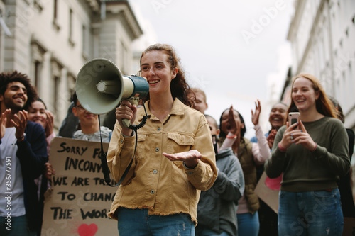 Woman with a megaphone in a rally © Jacob Lund